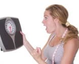 woman holding scale